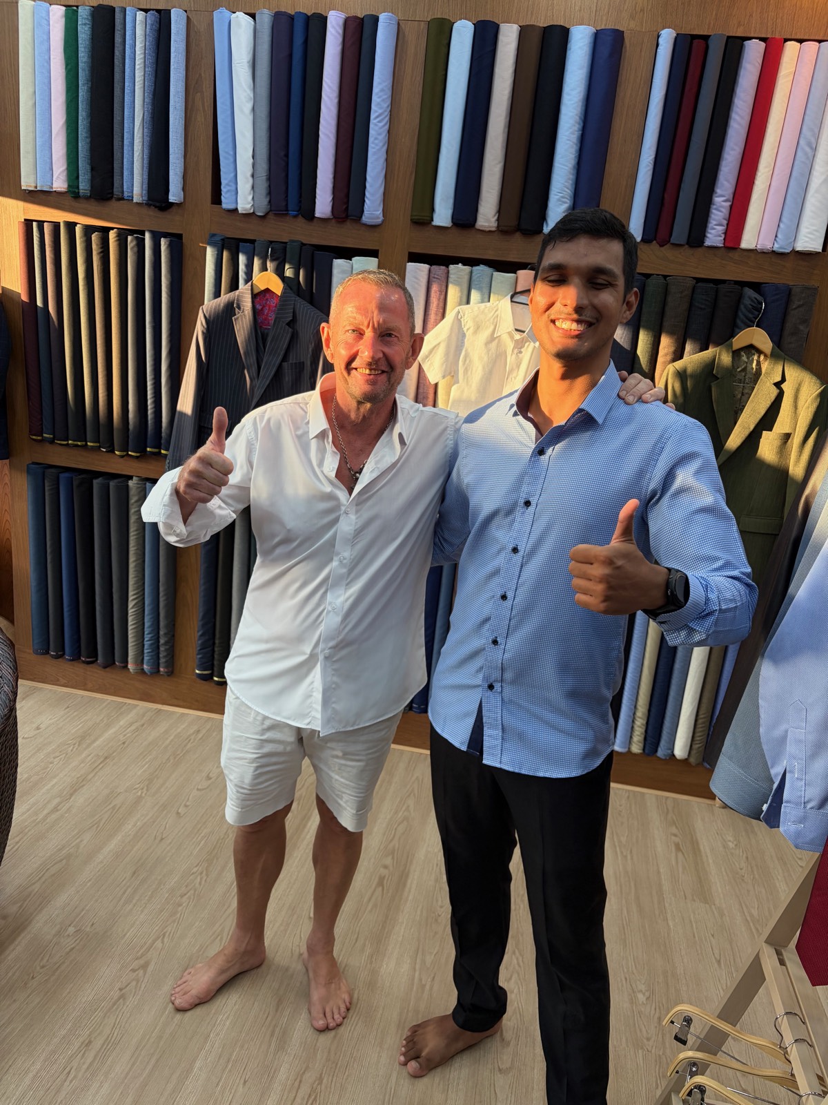 Happy client with the tailor