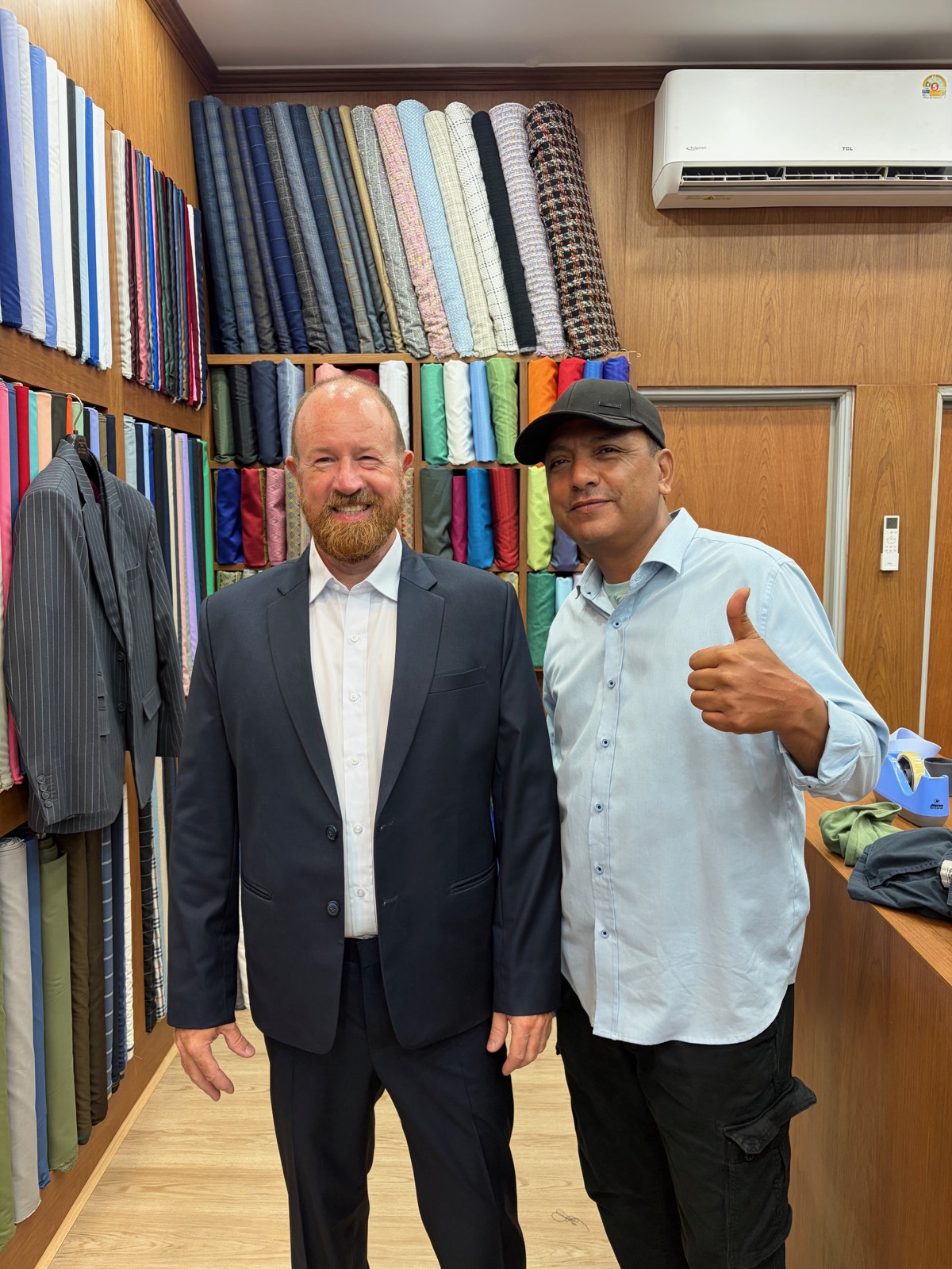 Client at a navy suit fitting