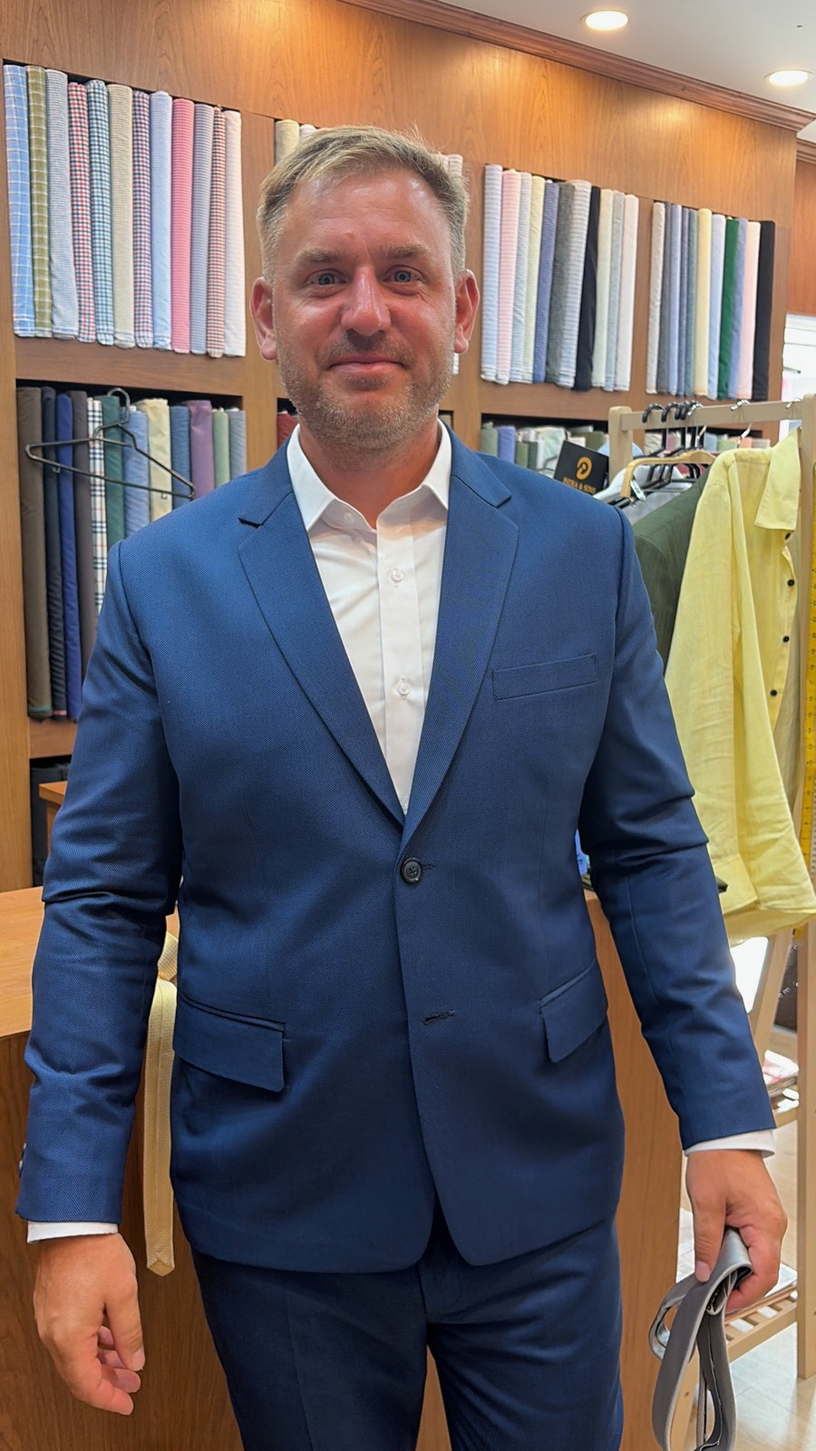 Client in a royal blue suit