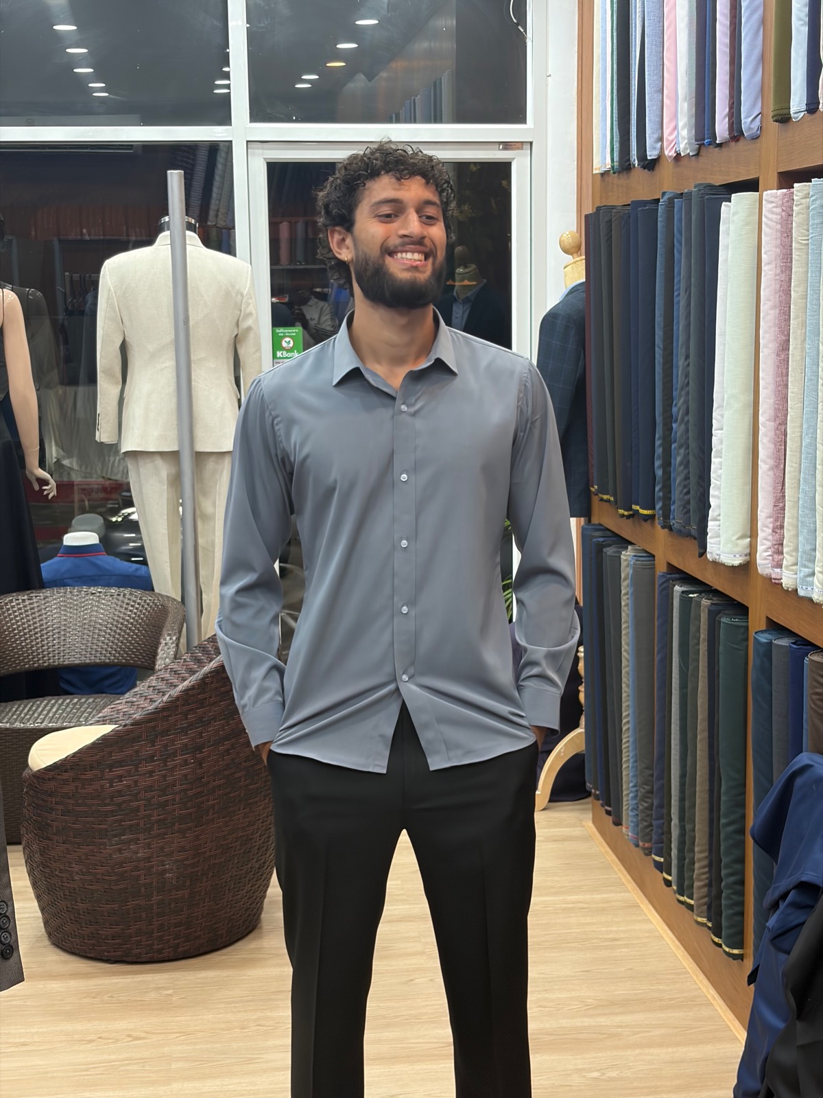 Client in a slate blue dress shirt